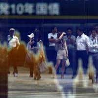 Economists lowered their forecasts for the economy this week, making the central bank\'s growth outlook for this year look increasingly optimistic. | BLOOMBERG