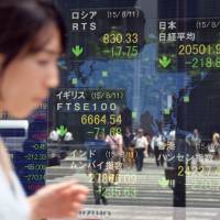 Tokyo stocks fell 1.09 percent in morning trading Wednesday after China devalued its currency for the second day in a row, aggravating worries about the strength of the world\'s No. 2 economy. | AFP-JIJI