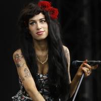 Big screen approach: Seen here in a 2008 photo, singer Amy Winehouse’s 2006 album “Back to Black” recently received a bump in sales after a documentary about the star, “Amy,” premiered in the North America and the United Kingdom. Why the world's largest record label wants to be a movie studio