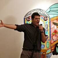 Stand-up comedian Shehzad Ghias Shaikh performs during a show at The Second Floor (T2F), a community space for open dialogue, in Karachi, Pakistan, Sunday. | PAKISTAN-COMEDY/ REUTERS