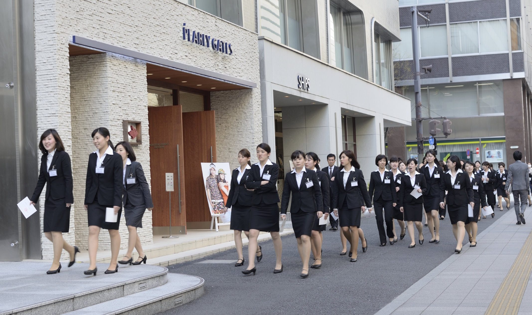 New recruits head to their company in the Marunouchi district of Tokyo. In a recent survey of workers in between the ages of 18 and 29, only 17.3 percent said they would devote their entire working life to one employer, a work style known as 'lifetime employment' that long characterized employment in postwar Japan. | ISTOCK