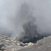 Smoke rises from Mount Aso in Kumamoto Prefecture after a small volcanic eruption occurred Saturday. | JAPAN METEOROLOGICAL AGENCY/KYODO