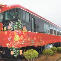 Hanayome Noren (Bride Curtain), West Japan Railway Co.’s tourist train decorated inside and out with motifs representing local traditional crafts, is parked in the city of Hakusan, near Kanazawa. The train will run on the JR Nanao Line beginning in October. | KYODO