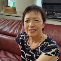 Midori Yamada, the 66-year-old child of a Hiroshima hibakusha, is interviewed in July in Shinjuku Ward, Tokyo. | TOMOHIRO OSAKI