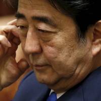 It’s complicated: Prime Minister Shinzo Abe’s upcoming statement to mark the 70th anniversary of the end of World War II will apparently focus on the future rather than the past. | TORU HANAI / REUTERS