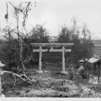 Survivor: The torii gate at Tinian\'s Hinode Shrine survived the battle in 1944 and still stands. | USMC