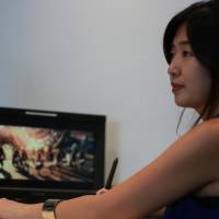 Making cuts: Cutters\' film editor Aki Mizutani shapes the nuances of AKB48\'s epic 12-minute music video, \"Bokutachi wa Tatakawanai\" (\"We Won\'t Fight\"). | KOSUKE SASAKI