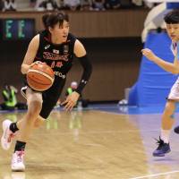 Japan shooting guard Sanae Motokawa, seen in a file photo, scored eight points in a 60-44 win over Taiwan at the FIBA Asia Women\'s Championship on Monday in Wuhan, China. | MELYNIE YONEDA