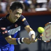Kei Nishikori plays a shot during his 6-3, 6-0 defeat to Andy Murray in the Rogers Cup semifinals in Montreal on Saturday. | AP