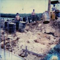 A picture supplied by Kris Roberts, former maintenance chief at the U.S. Marine Corps Futenma Air Station in Okinawa, shows the work site where he says he unearthed 100 barrels &#8212; some of which contained Agent Orange &#8212; in 1981. He has now won compensation from the U.S. for dioxin exposure at Futenma. | COURTESY OF KRIS ROBERTS