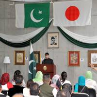 Pakistan Ambassador Farukh Amil speaks at an Independence Day event at the embassy. | YOSHIAKI MIURA