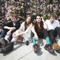 Ones to keep watching: British group Wolf Alice (from left: Theo Ellis, Ellie Rowsell, Joel Amey and Joff Oddie) has been generating buzz in the London music scene for quite some time, but only recently released its debut album, \"My Love Is Cool\" (right). | JENN FIVE