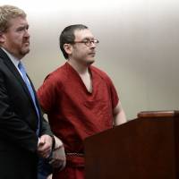 Colorado theater shooter James Holmes appears in court with his attorney Daniel King, to be formally sentenced Aug. 26, 2015 in Centennial, Colorado. Holmes was sentenced to life in prison without parole. Holmes bared clear deadly intent to school authorities before theater massacre, wasn't detained: records