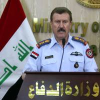 Iraqi Staff Lt. Gen. Anwar Hama Amin delivers a speech during a press conference in Baghdad on Sunday. Iraq\'s newly-acquired F-16 warplanes have begun carrying out strikes against the Islamic State jihadi group, according to the commander of the air force. The U.S.-led coalition has carried out over a dozen strikes on Islamic State targets as well. | AFP-JIJI