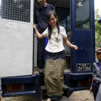 Student activist Phyo Phyo Aung arrives at a mass trial of student protesters at Tharrawaddy court in Tharrawaddy, Myanmar, in July. | REUTERS