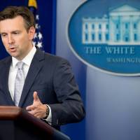 White House press secretary Josh Earnest talks to the media during the daily press briefing at the White House in Washington, Thursday. Earnest discussed Obama\'s upcoming meeting with Russian President Vladimir Putin, the state visit by Chinese President Xi Jinping and other topics. | AP