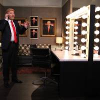 In this image released by NBC, host Jimmy Fallon (left) and Republican presidential candidate Donald Trump appear in the “Trump in the Mirror” skit during a taping of “The Tonight Show Starring Jimmy Fallon,” on Friday in New York. Trump’s Republican rivals are taking aim at the brash real estate mogul. Republican rivals seen taking aim at 'disaster' Trump