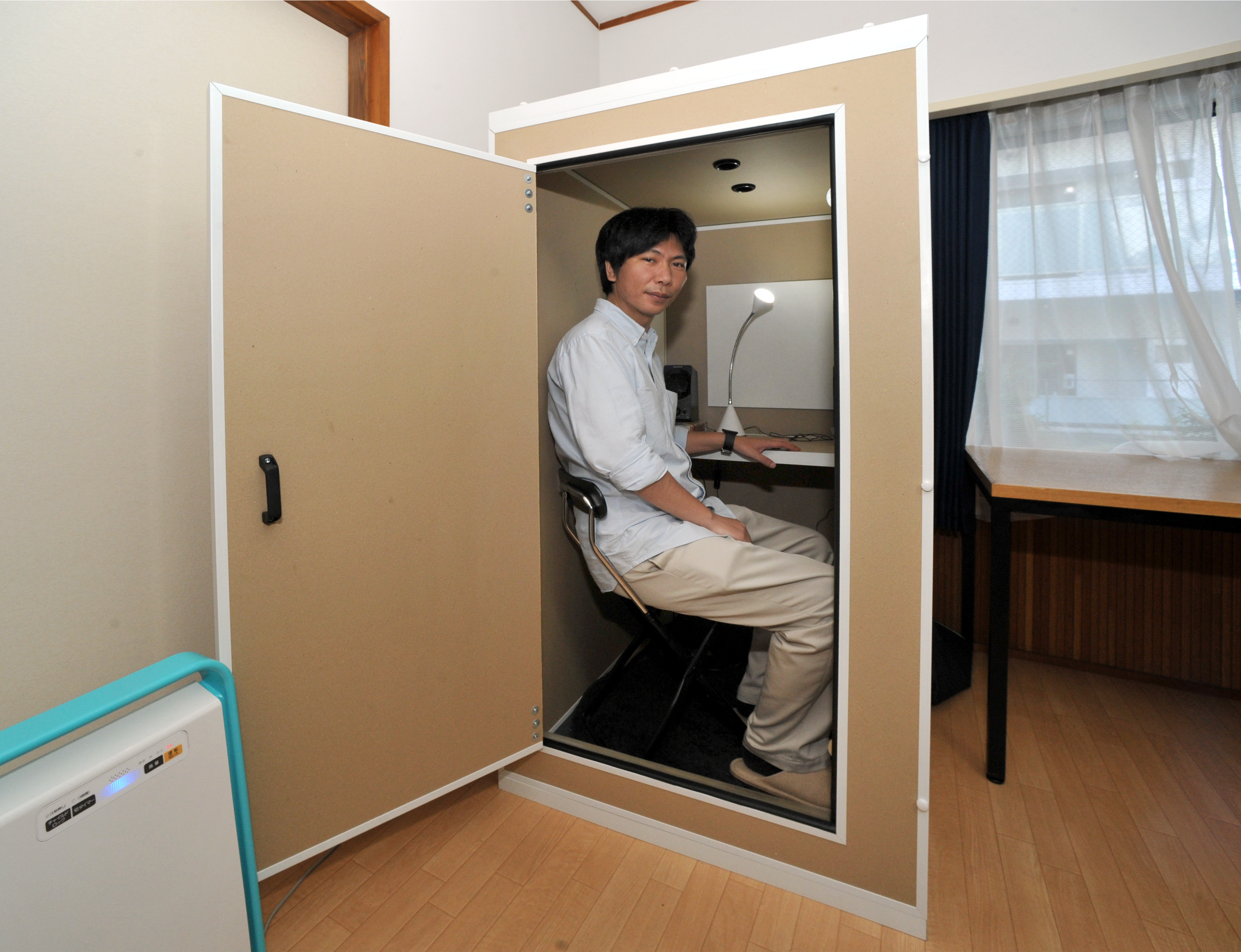 Thinking Inside The Box Cardboard Cubicles Offer Entertainment Vibe Inc Technical Producer Mizuki Fujiyama Sits Inside A Danbocchi Unit At The Company S Office