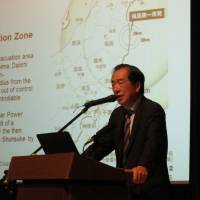 Former Prime Minister Naoto Kan speaks about his experience with the Fukushima nuclear disaster to foreign residents in Tokyo during a lecture Wednesday. | KAZUAKI NAGATA