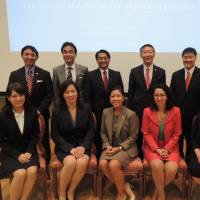 A delegation of U.S. legislators take photos with participants of a conference on Asian-American legislators on Monday at Kyoto\'s Ritsumeikan University. | COURTESY OF THE U.S.- JAPAN COUNCIL
