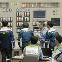 Inspectors from the Nuclear Regulation Authority conduct final checks on reactor No. 1 at Kyushu Electric Power Co.\'s Sendai nuclear power plant on Thursday. | KYODO