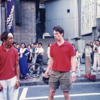 Patrick Harlan performs one of his first comedy sketches with his partner, Makoto Yoshida, in Shibuya, Tokyo, in 1996. | COURTESY OF PATRICK HARLAN
