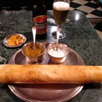 The dosa pancake, offered either plain or masala (stuffed with spicy potatoes), at Dharmasagara, a go-to spot in Higashi-Ginza for South Indian cuisine.  | ROBBIE SWINNERTON