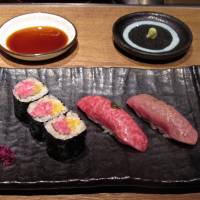 The finale: wagyu sushi. strips of beef pressed onto rice flavored with ginger rather than vinegar, and served with a few maki (rolled) sushi.
 | ROBBIE SWINNERTON