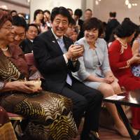 Tea time in Tokyo: Liberian President Ellen Johnson Sirleaf (left) joins Prime Minister Shinzo Abe and his wife, Akie, at a tea ceremony in Tokyo. Seated next to them are Vietnam\'s deputy chairwoman of the national assembly, Nguyen Thi Kim Ngan (second from right), and U.S. Ambassador Caroline Kennedy. | AFP-JIJI