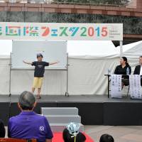 Ryotaro Takagaki (9), speaks about Australia on his way to winning the seventh Children\'s International Speech Contest at the Children\'s International Festa 2015 at Ebisu Garden Place on Sept. 6. | YOSHIAKI MIURA