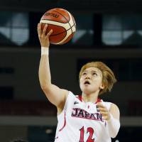 Japan guard Asami Yoshida shoots a layup against Taiwan during the FIBA Asia Women\'s Championship semifinals on Friday in Wuhan, China. Japan defeated Taiwan 65-58. | KYODO