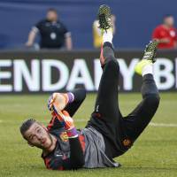 Manchester United goalkeeper David De Gea will remain at Old Trafford after his proposed transfer to Real Madrid fell through on Monday. | AP