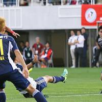 Montedio\'s Kim Byeom-yong scores against Yamaga on Wednesday in Matsumoto, Nagano Prefecture. The match ended in a 2-2 draw. | KYODO