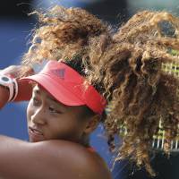 Naomi Osaka plays a shot during her first-round defeat to Barbora Strycova at the Pan Pacific Open on Monday. | AP