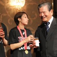Japan Basketball Association president Saburo Kawabuchi smiles at a celebration party for the Japan women\'s national team on Sunday. | KAZ NAGATSUKA