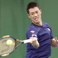 Kei Nishikori hits a shot during a practice session on Wednesday. | KYODO