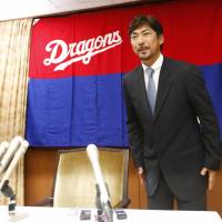 The Dragons\' Michihiro Ogasawara bows during a news conference on Thursday in Nagoya. The 41-year-old is retiring at the end of the season. | KYODO