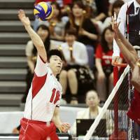Japan\'s Yuta Yoneyama spikes the ball against Venezuela during an FIVB Men\'s Volleyball World Cup match on Thursday in Osaka. Japan defeated Venezuela  33-31, 26-24, 25-19. | KYODO