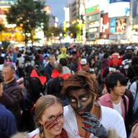 Wolf & the Hood: Halloween revelry peaked Saturday night in Japan and the area around Shibuya Station, in particular, saw a massive convergence of people decked out in a variety of costumes. | YOSHIAKI MIURA