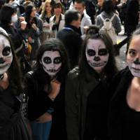 Bring out your dead: The stuff of nightmares: Halloween revelry peaked Saturday night in Japan and the area around Shibuya Station, in particular, saw a massive convergence of people decked out in a variety of costumes. | YOSHIAKI MIURA
