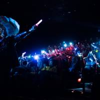 The crowd gets out glow sticks and smartphones during the performance of “There’s a Light (Over at the Frankenstein Place).” | DAN SZPARA