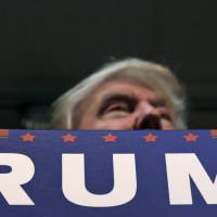 Republican presidential candidate Donald Trump addresses a crowd during an Oct. 14 campaign rally in Tyngsborough, Massachusetts. | AP