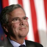 Republican presidential candidate former Florida Gov. Jeb Bush listens in Davenport, Iowa, on Oct. 6. | AP