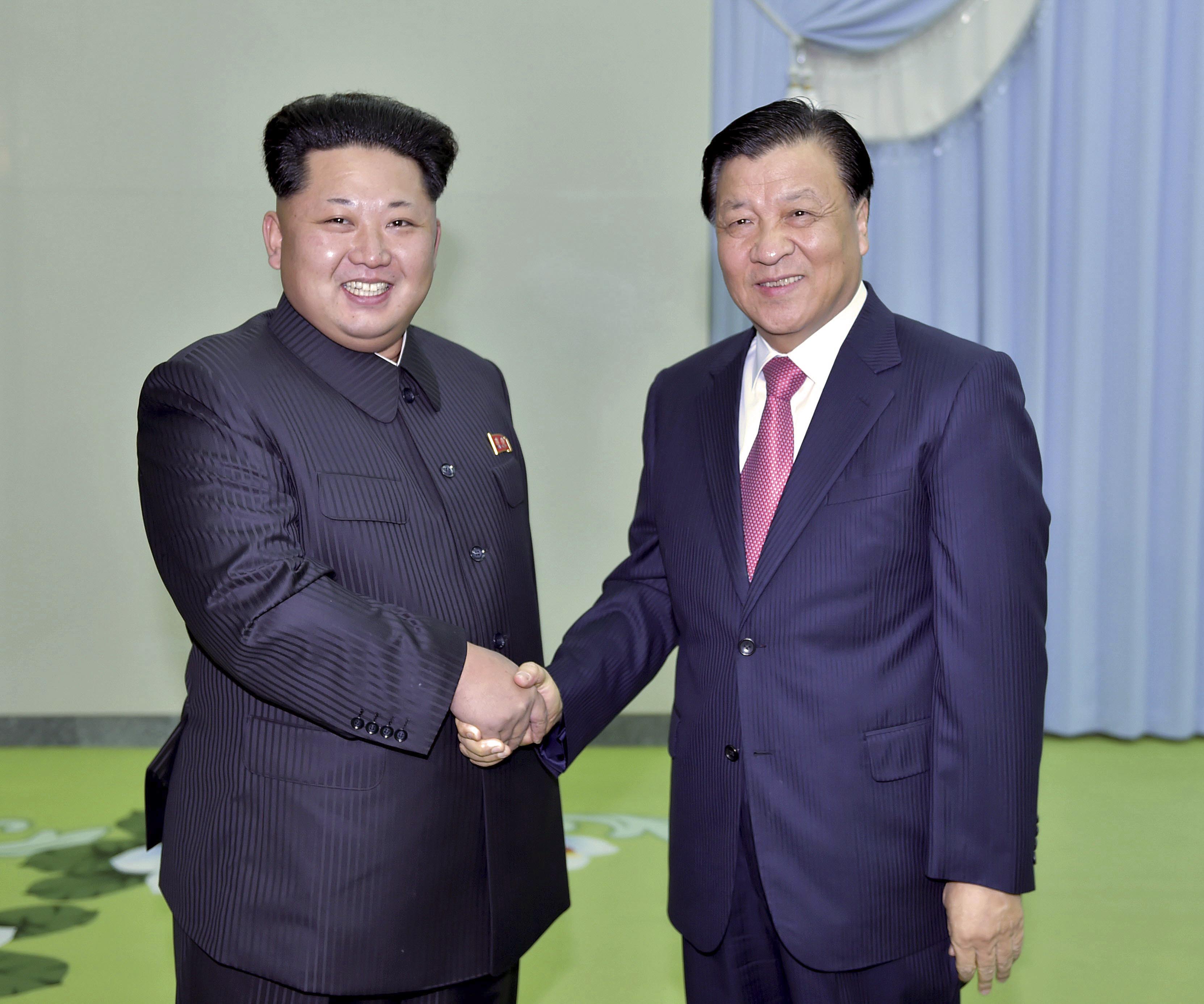 North Korean leader Kim Jong Un meets Liu Yunshan, a senior Chinese Communist official, in Pyongyang on Friday. | AP