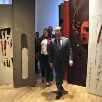 French President Francois Hollande (center) visits the Museum of Mankind (Musee de l\'Homme) during its inauguration in Paris on Thursday. The museum, dedicated to anthropology, ethnology and prehistory of human evolution, will open to the public this weekend after six years of renovation. | REUTERS