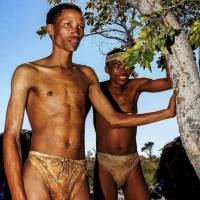 Two San bushmen are shown in Tsumkwe, Namibia, prior to participating in a study on the sleep patterns of people living in traditional societies. | REUTERS