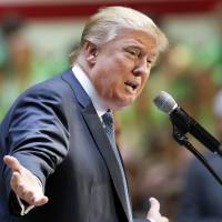 Republican presidential candidate Donald Trump speaks during a No Labels Problem Solver convention Monday in Manchester, New Hampshire. Trump will host \"Saturday Night Live\" next month. | AP