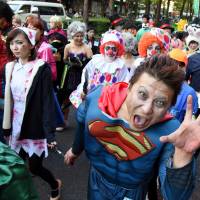 Super Zombie — hopefully not faster than a speeding bullet — at the Kawasaki Halloween Parade on Sunday.  | SATOKO KAWASAKI