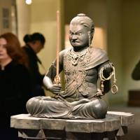 A statue by the sculptor Kaikei of the Buddhist deity known as Fudo Myoo is shown during a preview at New York\'s Metropolitan Museum of Art on Monday. | KYODO