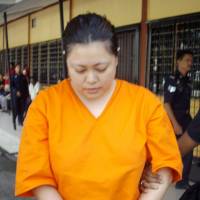 Mariko Takeuchi, whose death sentence over drug trafficking charges was confirmed by Malaysia\'s highest court on Thursday, is being out of a court on the outskirts of Kuala Lumpur in September 2011. | KYODO
